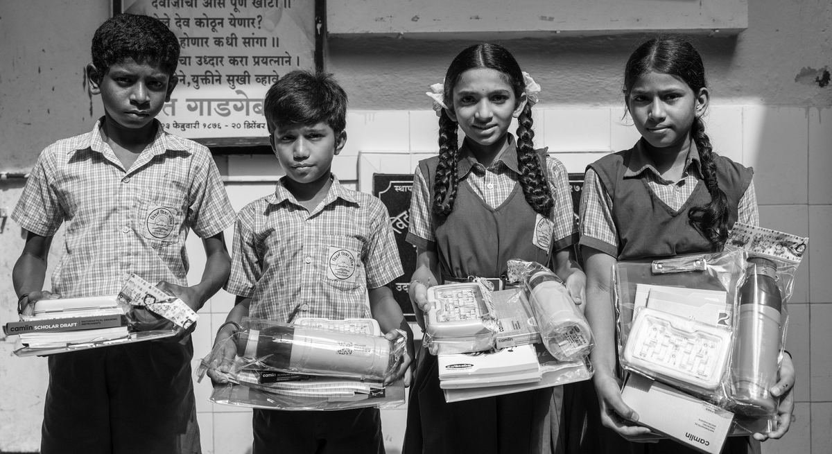 Students with their new school supplies