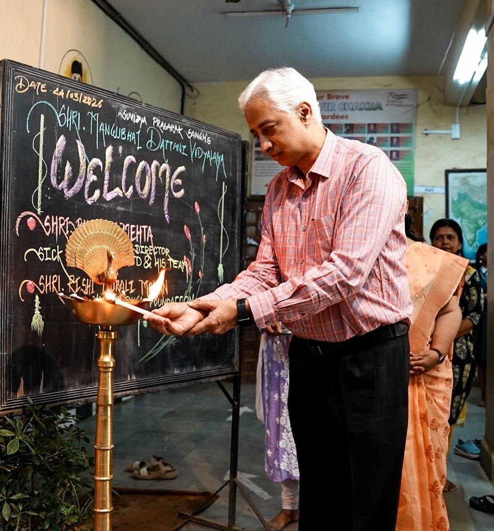Lighting the lamp at the inauguration