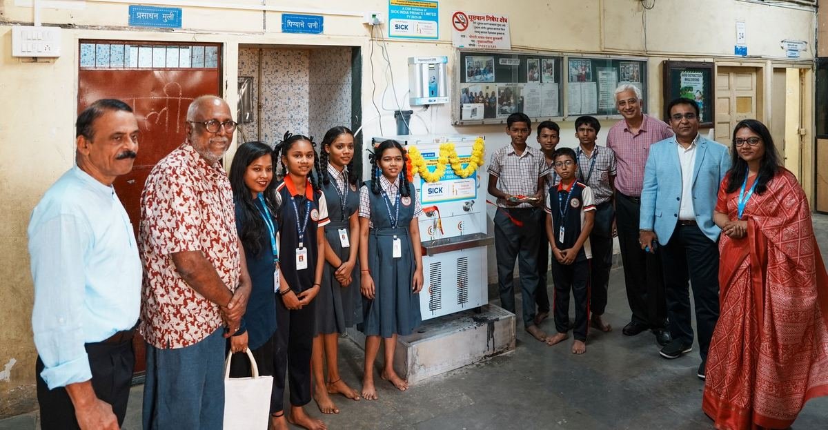 Students and guests at the new water cooler