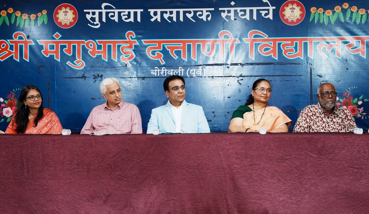 Guests on stage at the school